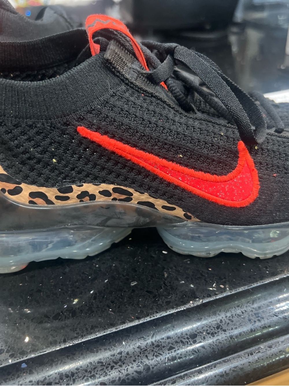 Nike Black Knit Sneakers with Red Swoosh and Leopard Accent - Picture 7 of 8
